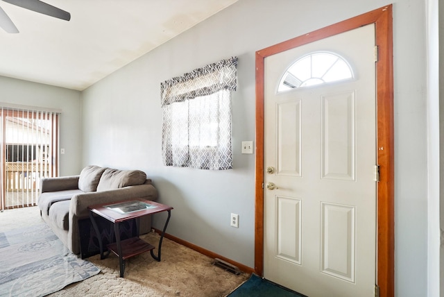 2981 Harrison St, Saginaw, MI 48604 - foyer entrance with baseboards, visible vents, and a ceiling fan