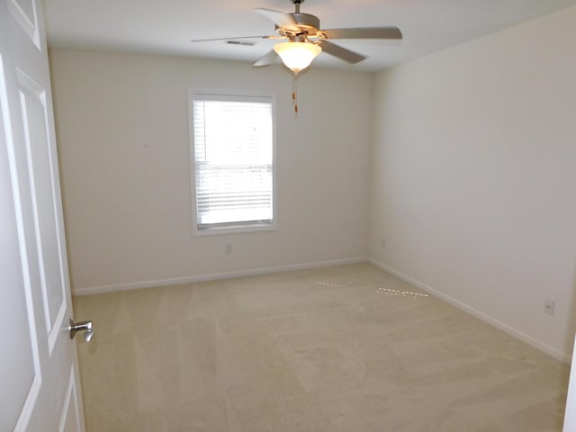 2535 Holiday House Rd Unit 24, Saint Joseph, MI 49085 - empty room with ceiling fan, light carpet, and baseboards