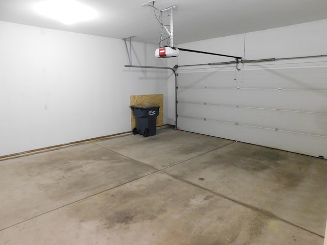 2535 Holiday House Rd Unit 24, Saint Joseph, MI 49085 - garage featuring a garage door opener