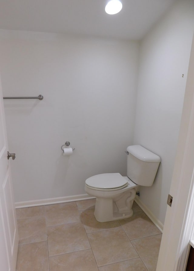 2535 Holiday House Rd Unit 24, Saint Joseph, MI 49085 - bathroom with toilet, tile patterned floors, and baseboards