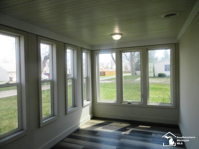 4393 2nd St, Newport, MI 48166 - unfurnished sunroom featuring visible vents, baseboards, and wood finished floors