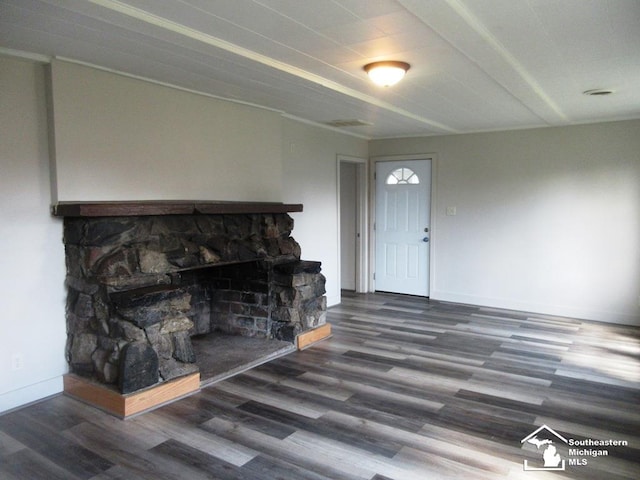 4393 2nd St, Newport, MI 48166 - unfurnished living room featuring wood finished floors, a fireplace, and baseboards