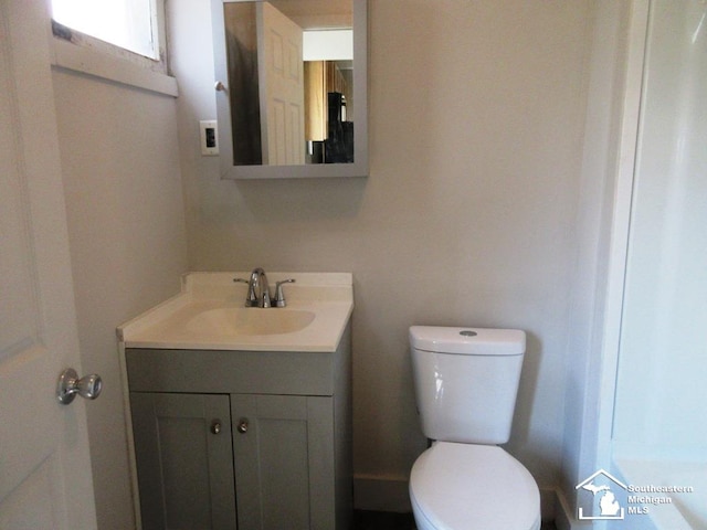4393 2nd St, Newport, MI 48166 - bathroom with toilet and vanity