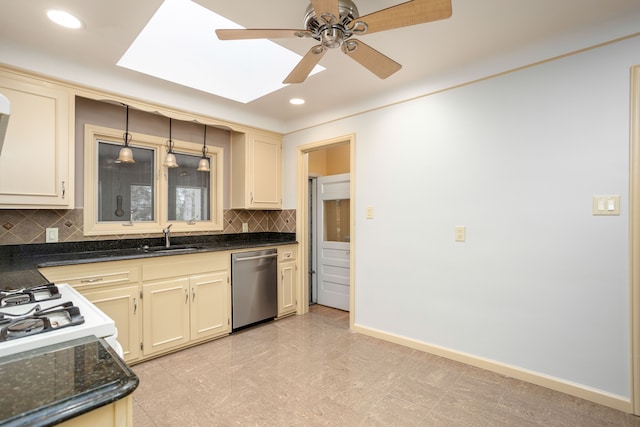 341 Ridgemont Rd, Grosse Pointe Farms, MI 48236 - kitchen featuring cream cabinets, a ceiling fan, a sink, a skylight, and dishwasher