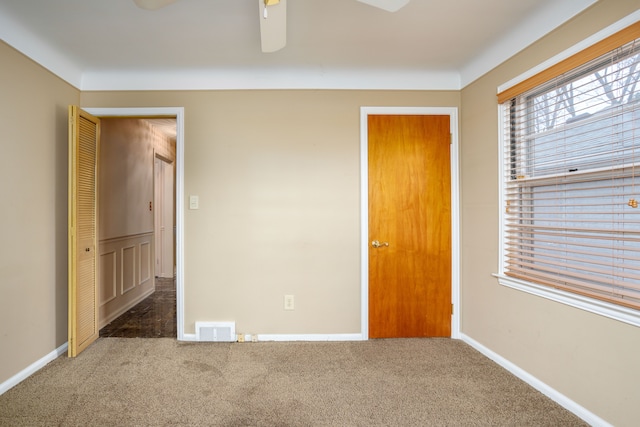 341 Ridgemont Rd, Grosse Pointe Farms, MI 48236 - unfurnished bedroom featuring ceiling fan, carpet floors, baseboards, and visible vents