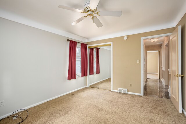 341 Ridgemont Rd, Grosse Pointe Farms, MI 48236 - unfurnished bedroom with ceiling fan, carpet flooring, a closet, and visible vents