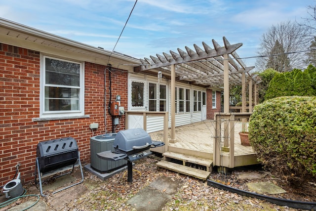 341 Ridgemont Rd, Grosse Pointe Farms, MI 48236 - deck featuring grilling area, a pergola, and central AC