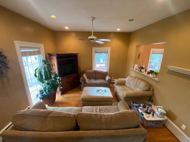 227 Railroad St, Chelsea, MI 48118 - living area with wood finished floors, recessed lighting, baseboards, ceiling fan, and a fireplace