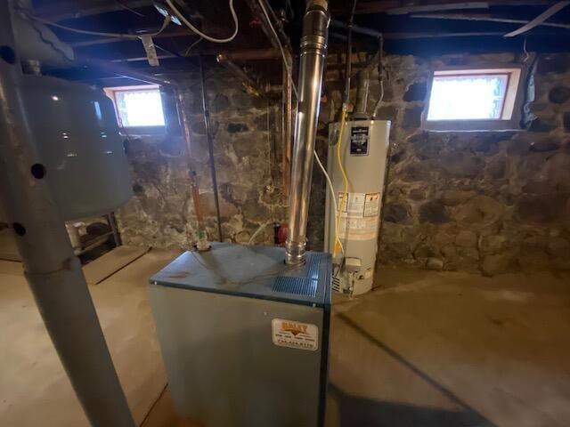 227 Railroad St, Chelsea, MI 48118 - basement with water heater and plenty of natural light