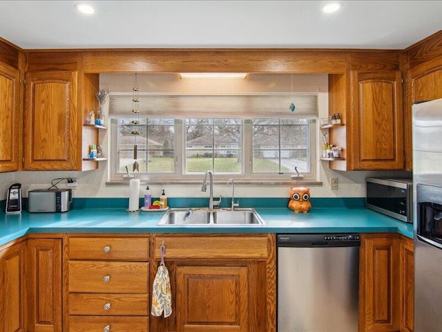 kitchen featuring brown cabinets, open shelves, a sink, and stainless steel appliances