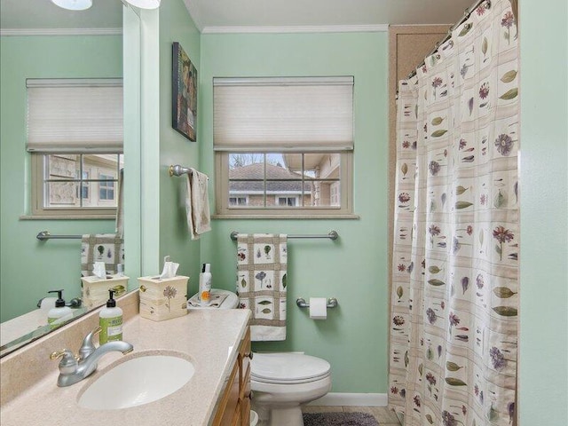 bathroom with a shower with shower curtain, crown molding, baseboards, toilet, and vanity