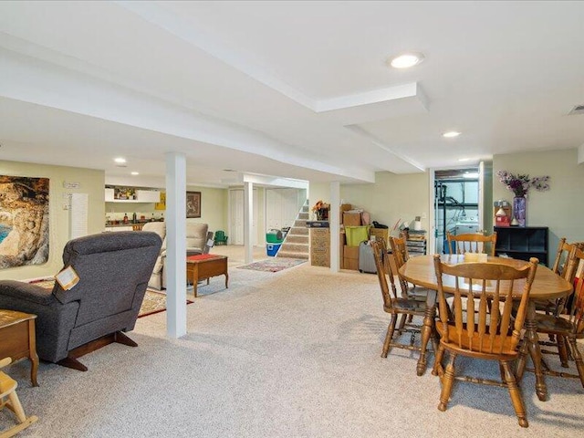 dining area featuring carpet floors, recessed lighting, stairs, and visible vents