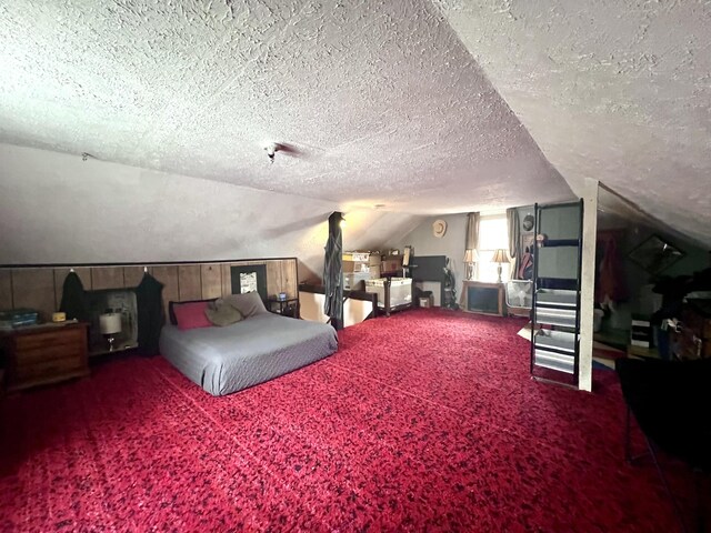 4480 Stanton Blvd, Montague, MI 49437 - carpeted bedroom with vaulted ceiling and a textured ceiling