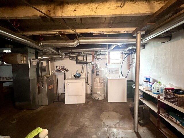 4480 Stanton Blvd, Montague, MI 49437 - basement featuring water heater, separate washer and dryer, and heating unit