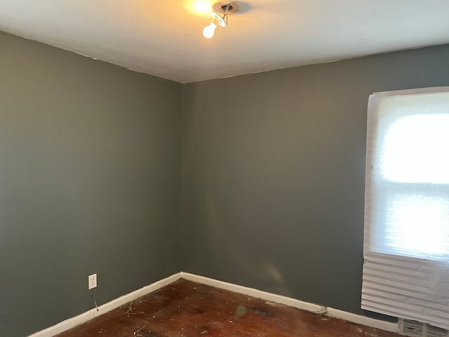 empty room with baseboards