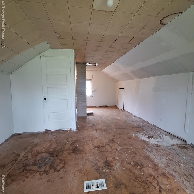 15368 Greydale St, Detroit, MI 48223 - bonus room featuring vaulted ceiling and unfinished concrete flooring