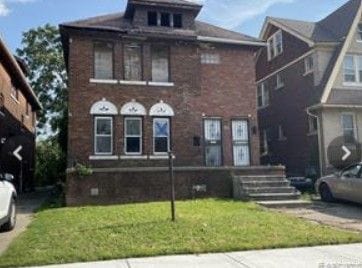 3771 Clements St, Detroit, MI 48238 - view of front facade featuring a front lawn