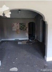 3771 Clements St, Detroit, MI 48238 - interior space featuring baseboards and arched walkways