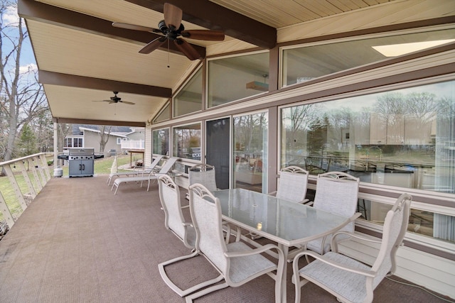 view of patio / terrace featuring outdoor dining area and ceiling fan