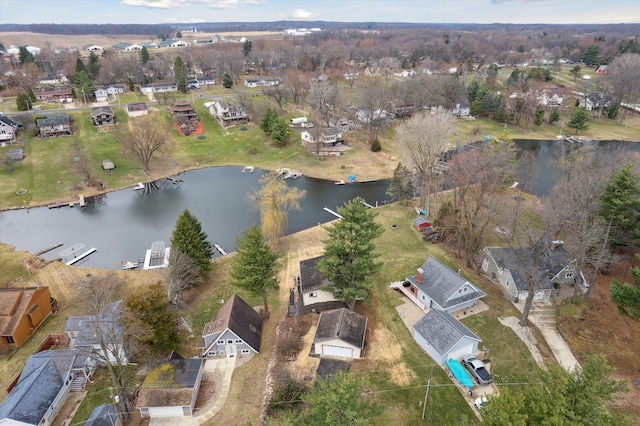 aerial view featuring a water view and a residential view