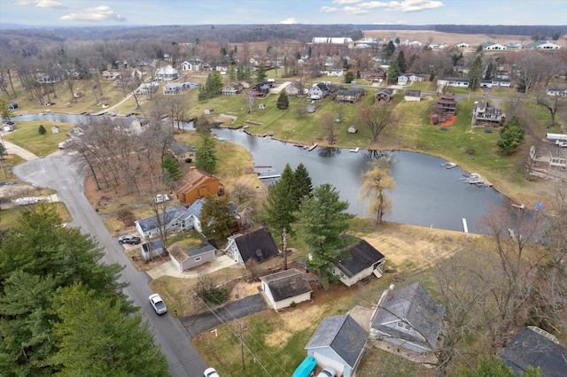 aerial view with a water view and a residential view