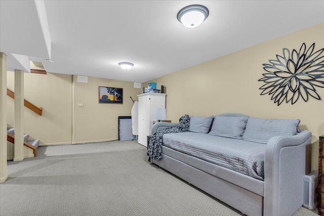 carpeted living room featuring stairway
