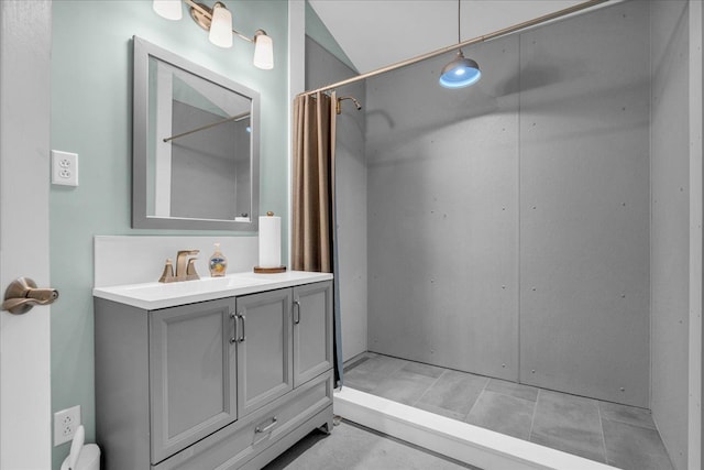 bathroom featuring vanity and a shower with curtain