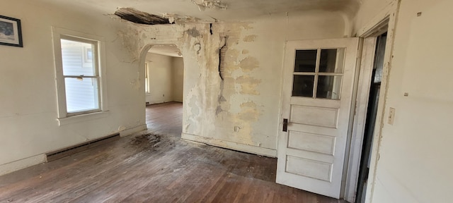 5640 Blue Star Hwy, South Haven, MI 49090 - unfurnished room with arched walkways and a baseboard radiator