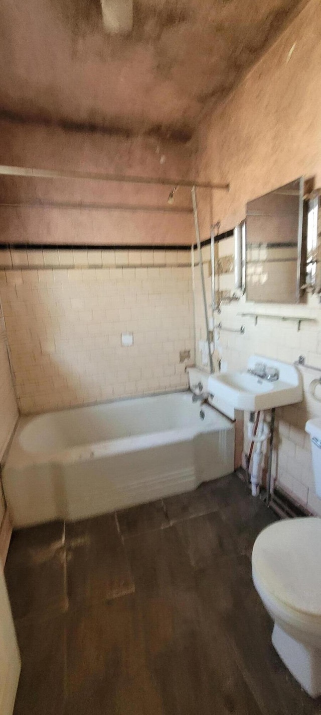 5640 Blue Star Hwy, South Haven, MI 49090 - bathroom with toilet and a washtub
