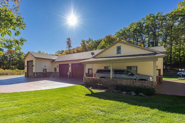 8366 Lynwood Ln, Mecosta, MI 49332 - view of front of property featuring driveway, a shingled roof, a garage, and a front lawn