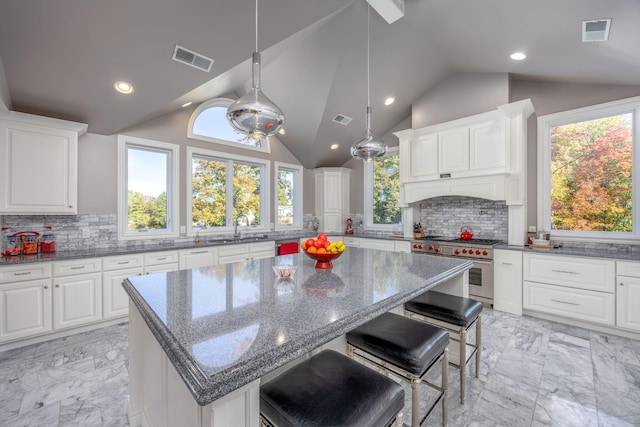 8366 Lynwood Ln, Mecosta, MI 49332 - kitchen featuring a sink, marble finish floor, visible vents, and appliances with stainless steel finishes