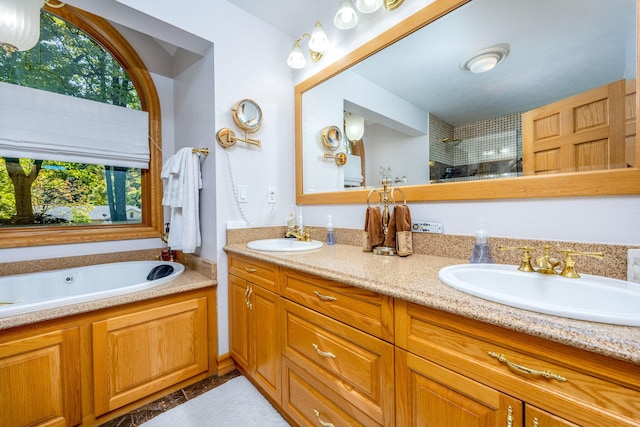 8366 Lynwood Ln, Mecosta, MI 49332 - bathroom with double vanity, a sink, a tile shower, and a garden tub