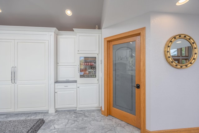 8366 Lynwood Ln, Mecosta, MI 49332 - kitchen featuring marble finish floor, white cabinets, and recessed lighting