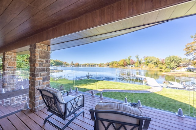 8366 Lynwood Ln, Mecosta, MI 49332 - deck with a boat dock, a water view, and a yard
