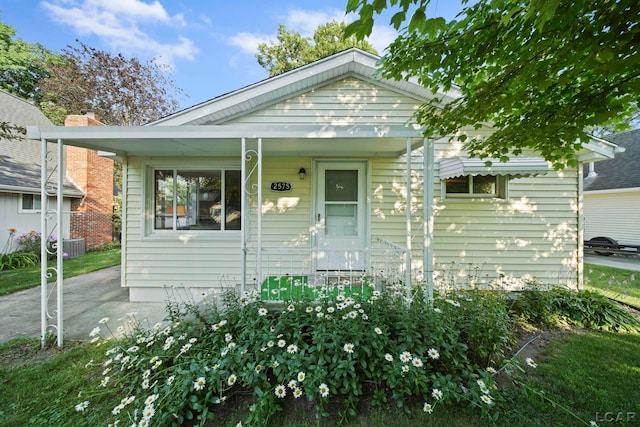 bungalow featuring covered porch