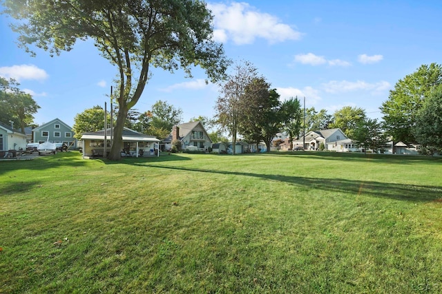 view of yard featuring a residential view