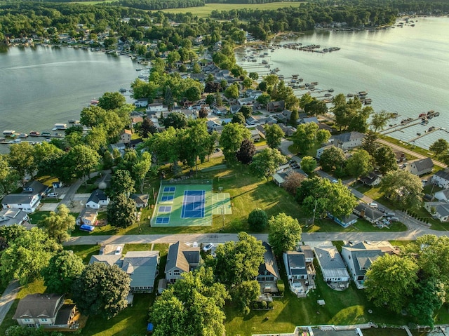 bird's eye view with a residential view and a water view