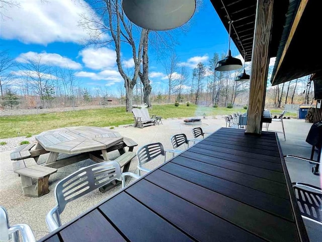 view of patio / terrace with outdoor dining area and fence