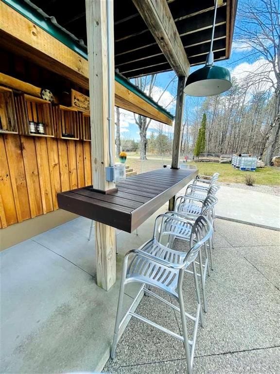 view of patio featuring outdoor dry bar