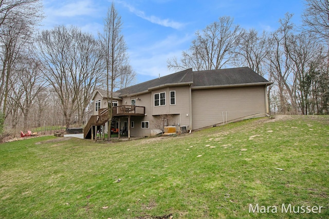 8821 Summerset Woods Ct SE, Alto, MI 49302 - rear view of property with stairway, a deck, and a lawn