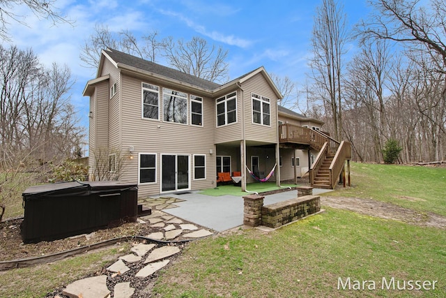 8821 Summerset Woods Ct SE, Alto, MI 49302 - rear view of house featuring a hot tub, a patio, stairs, a deck, and a yard