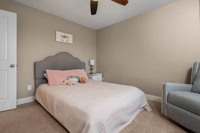 bedroom featuring carpet floors, baseboards, and ceiling fan