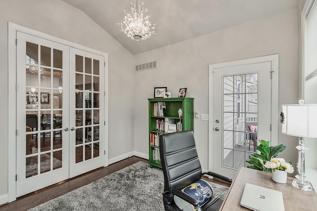 2667 Oxford Cir, Ann Arbor, MI 48103 - doorway to outside with french doors, lofted ceiling, wood finished floors, a chandelier, and baseboards