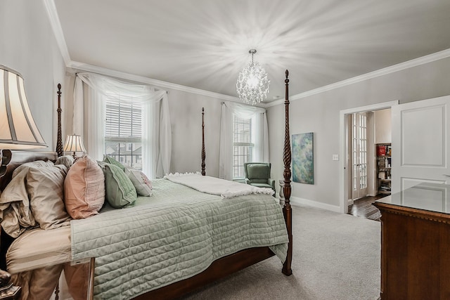 2667 Oxford Cir, Ann Arbor, MI 48103 - carpeted bedroom with ornamental molding, a chandelier, multiple windows, and baseboards