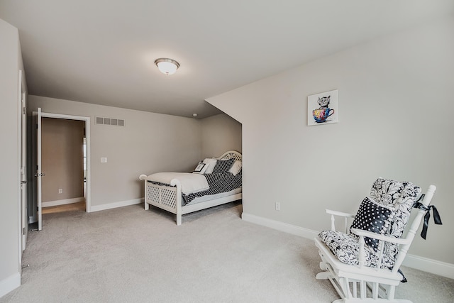 2667 Oxford Cir, Ann Arbor, MI 48103 - bedroom featuring light colored carpet and baseboards