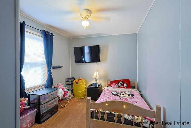 bedroom featuring carpet flooring and a ceiling fan