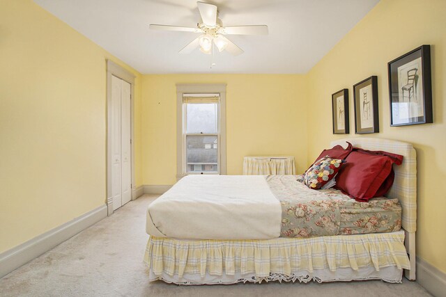 bedroom featuring baseboards, carpet flooring, and ceiling fan