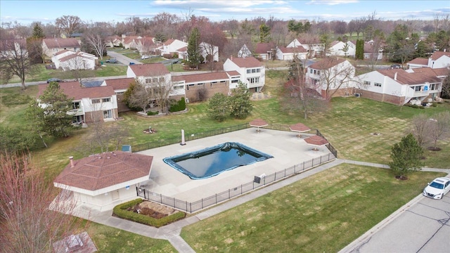 aerial view of residential area with a pool area