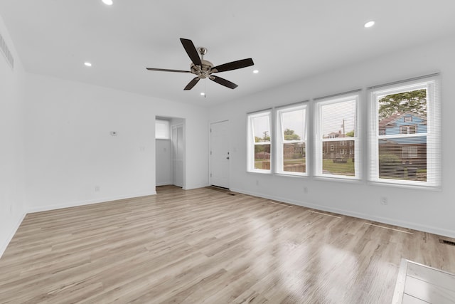 2916 Gladstone St, Detroit, MI 48206 - empty room featuring light wood-style floors, a healthy amount of sunlight, and recessed lighting