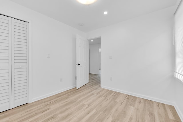 2916 Gladstone St, Detroit, MI 48206 - unfurnished bedroom with baseboards, recessed lighting, a closet, and light wood finished floors